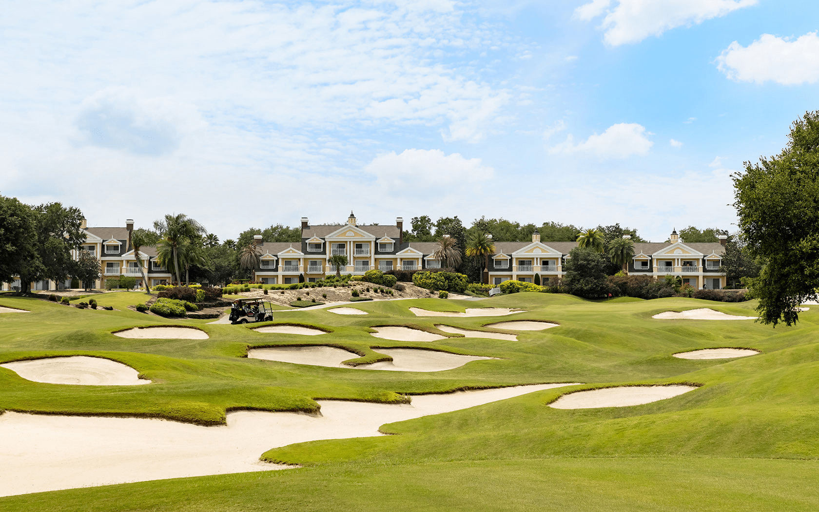 golf course with villas in the distance